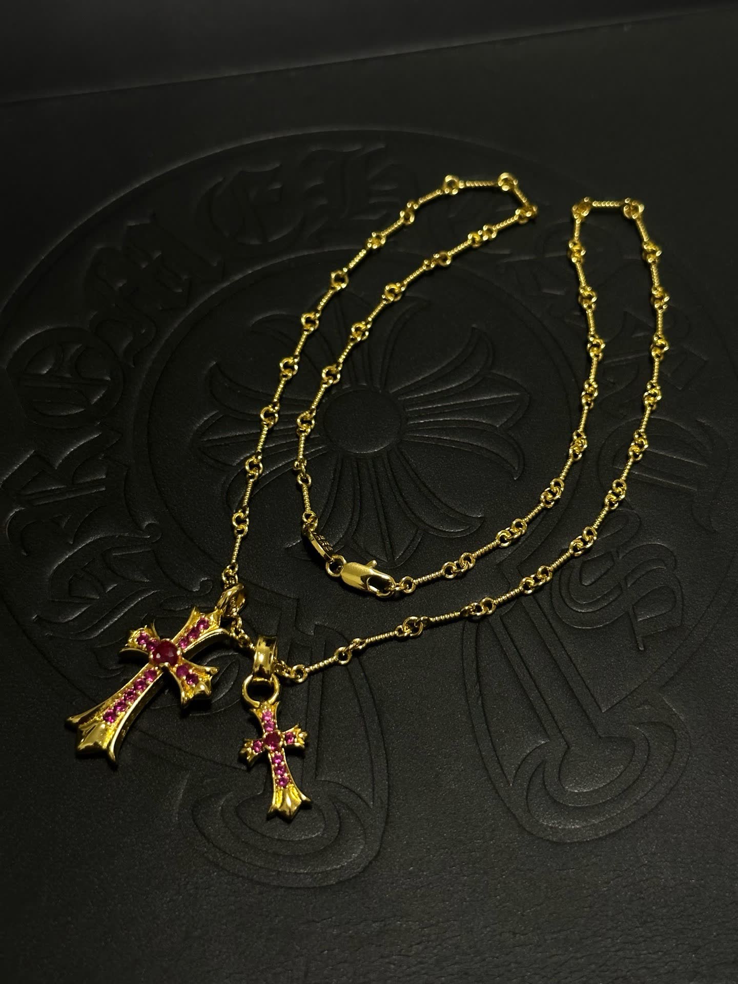 Chrome Hearts Gold Cross Pendant with Ruby Stones